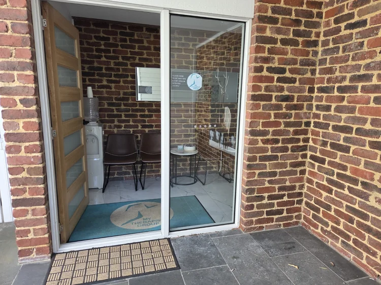 Open entrance to the clinic waiting area.