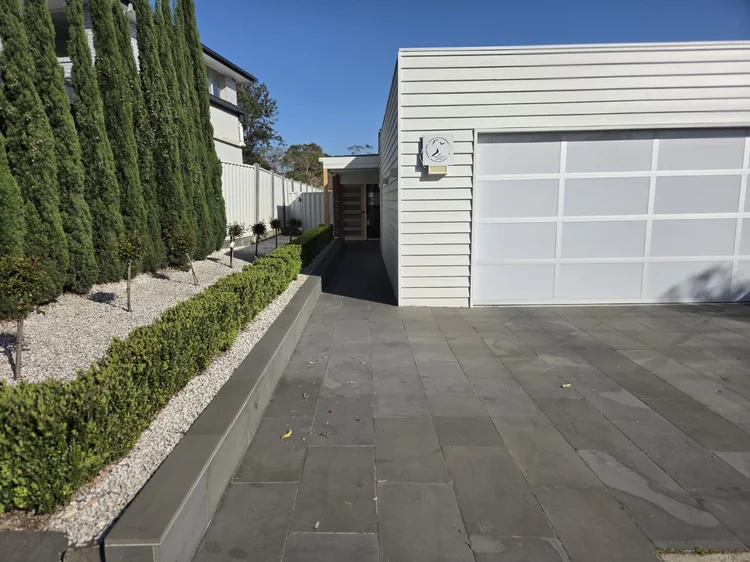 My Therapist Group clinic frontage and the path beside the garage.