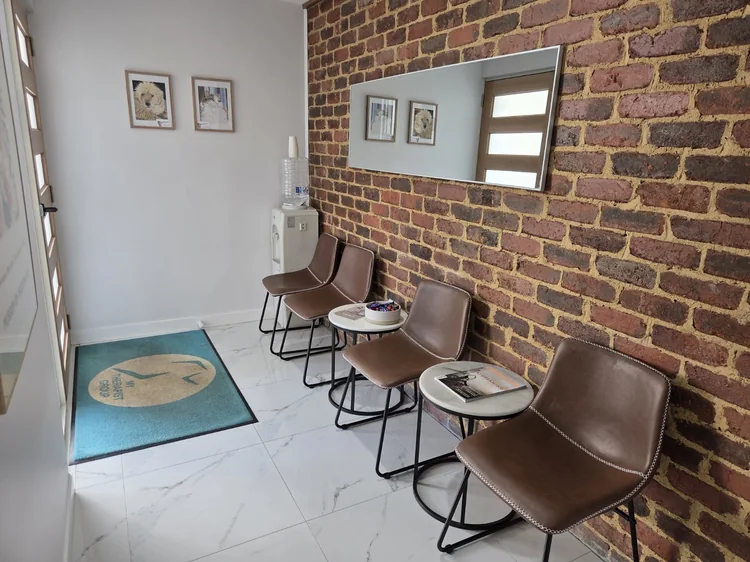 Clinic waiting area with chairs, water and the My Therapist Group mat.